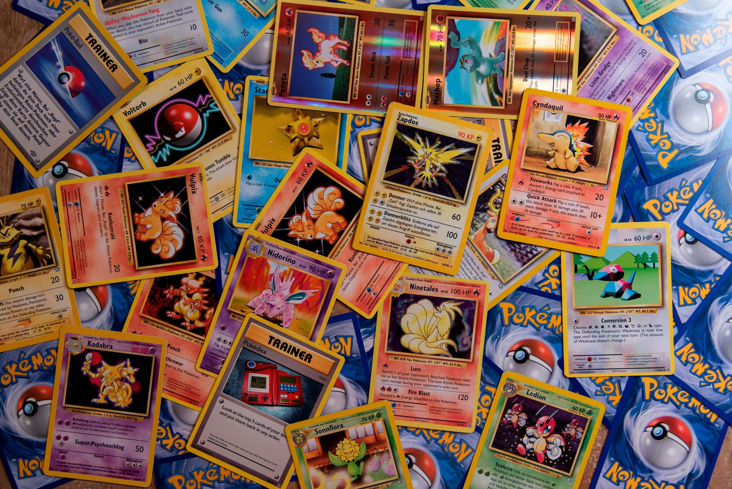 Pokemon TCG: 100 Assorted Card Lot with Foils - Bundle with a LCC Deck Box Included